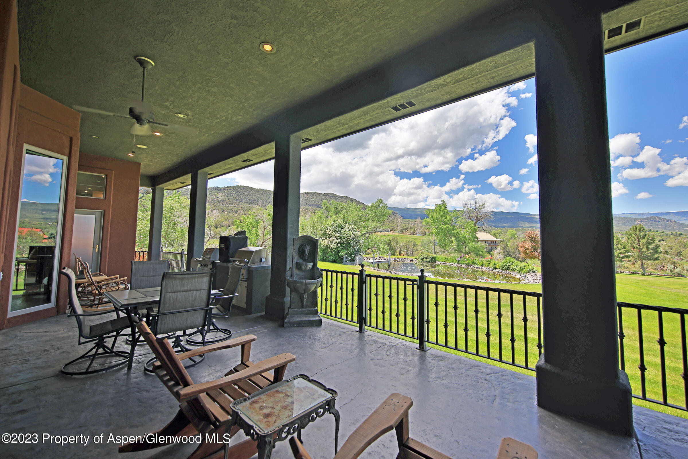 52962 KE Road Molina, CO 81646 - Photo 27 of 46 a living room with furniture and a large window