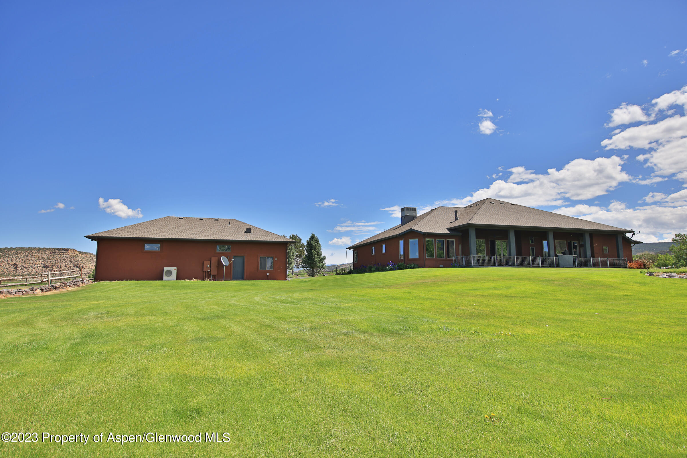 52962 KE Road Molina, CO 81646 - Photo 29 of 46 a view of a house with a yard
