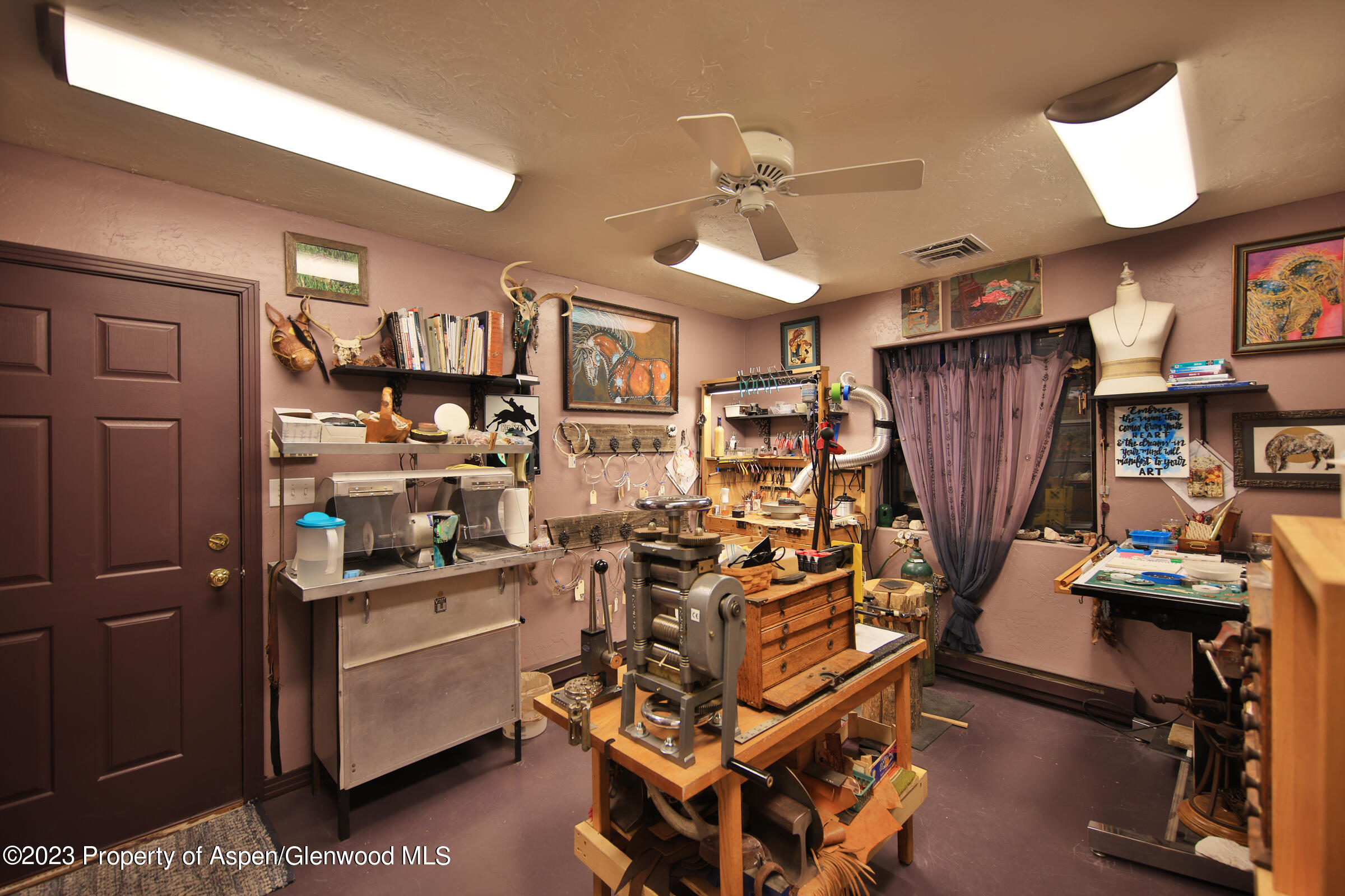 52962 KE Road Molina, CO 81646 - Photo 36 of 46 a view of a room with gym equipment