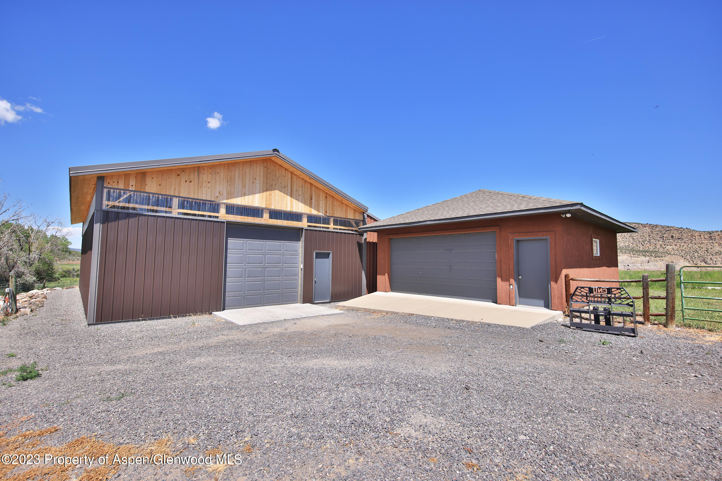 52962 KE Road Molina, CO 81646 - Photo 37 of 46 a backyard of a house with table and chairs