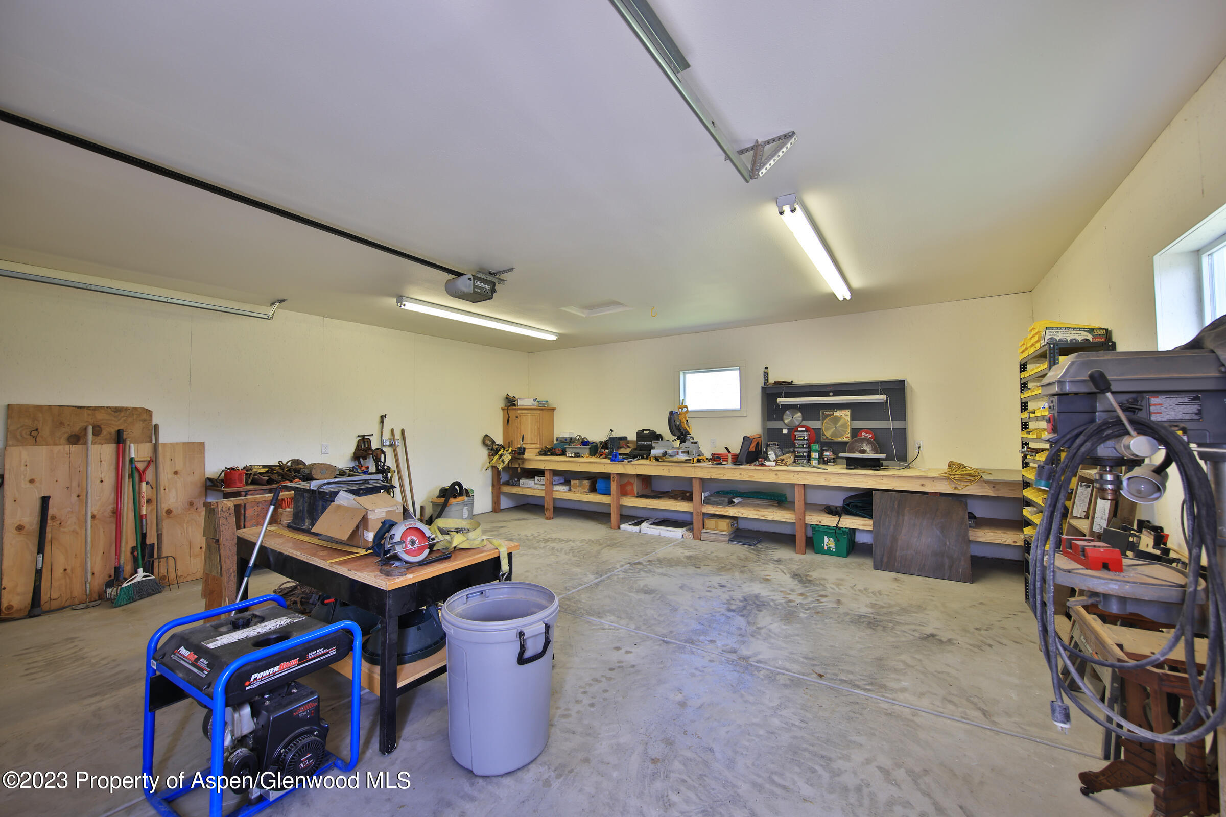 52962 KE Road Molina, CO 81646 - Photo 39 of 46 a living room with furniture and a flat screen tv
