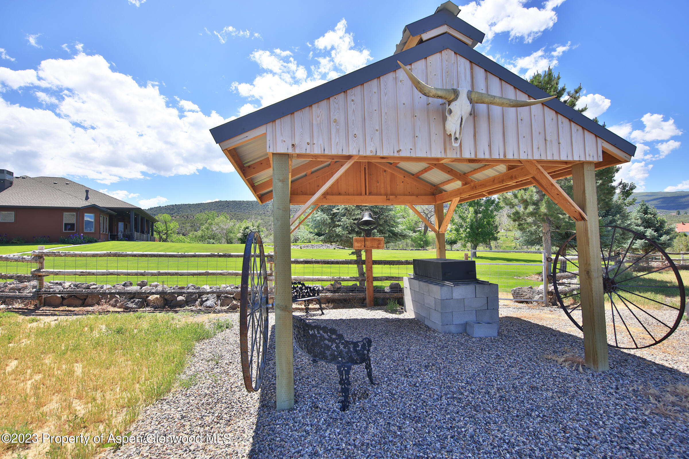 52962 KE Road Molina, CO 81646 - Photo 41 of 46 a view of a small deck with a yard fire pit and furniture