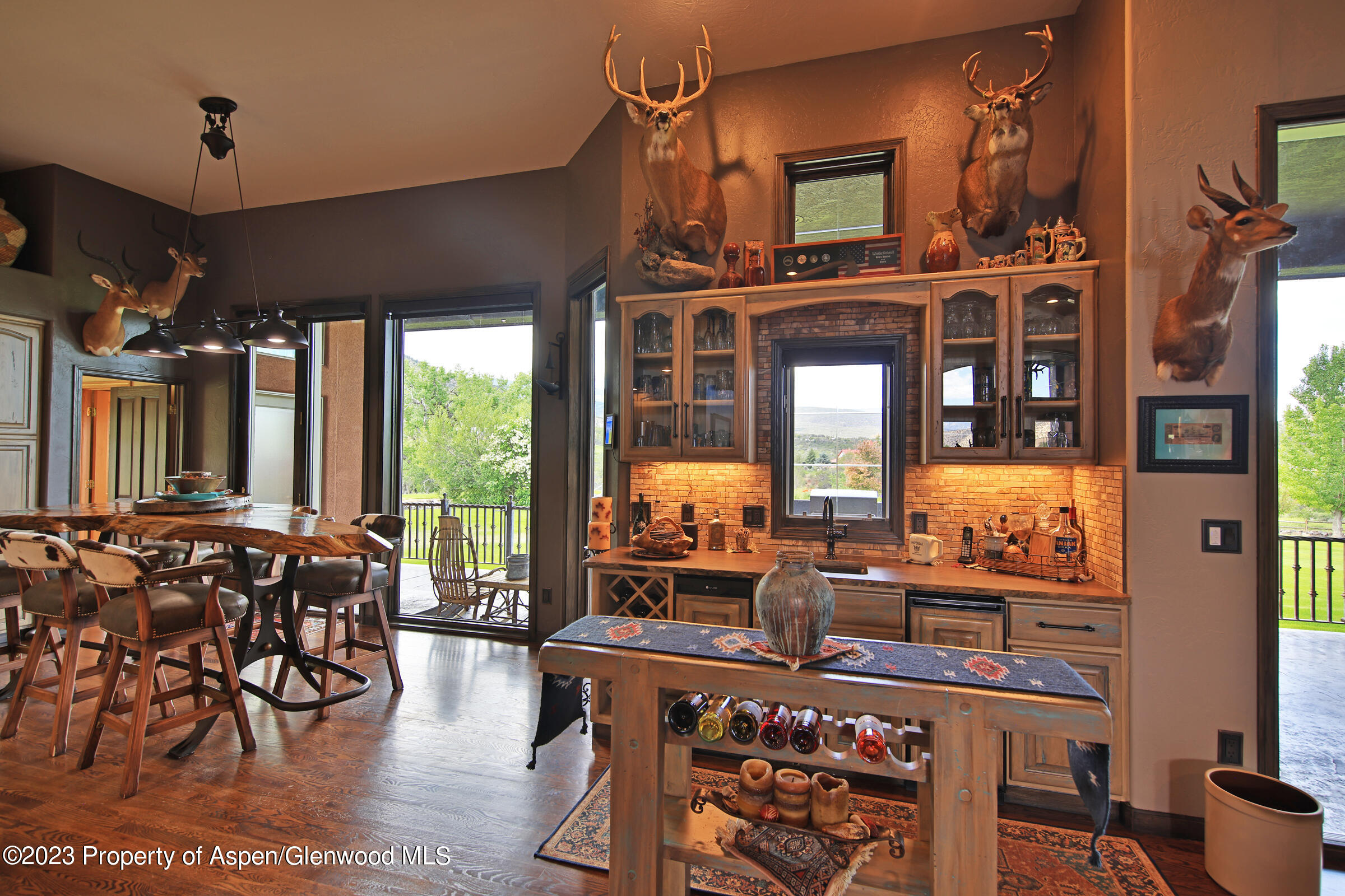52962 KE Road Molina, CO 81646 - Photo 9 of 46 a living room with large windows