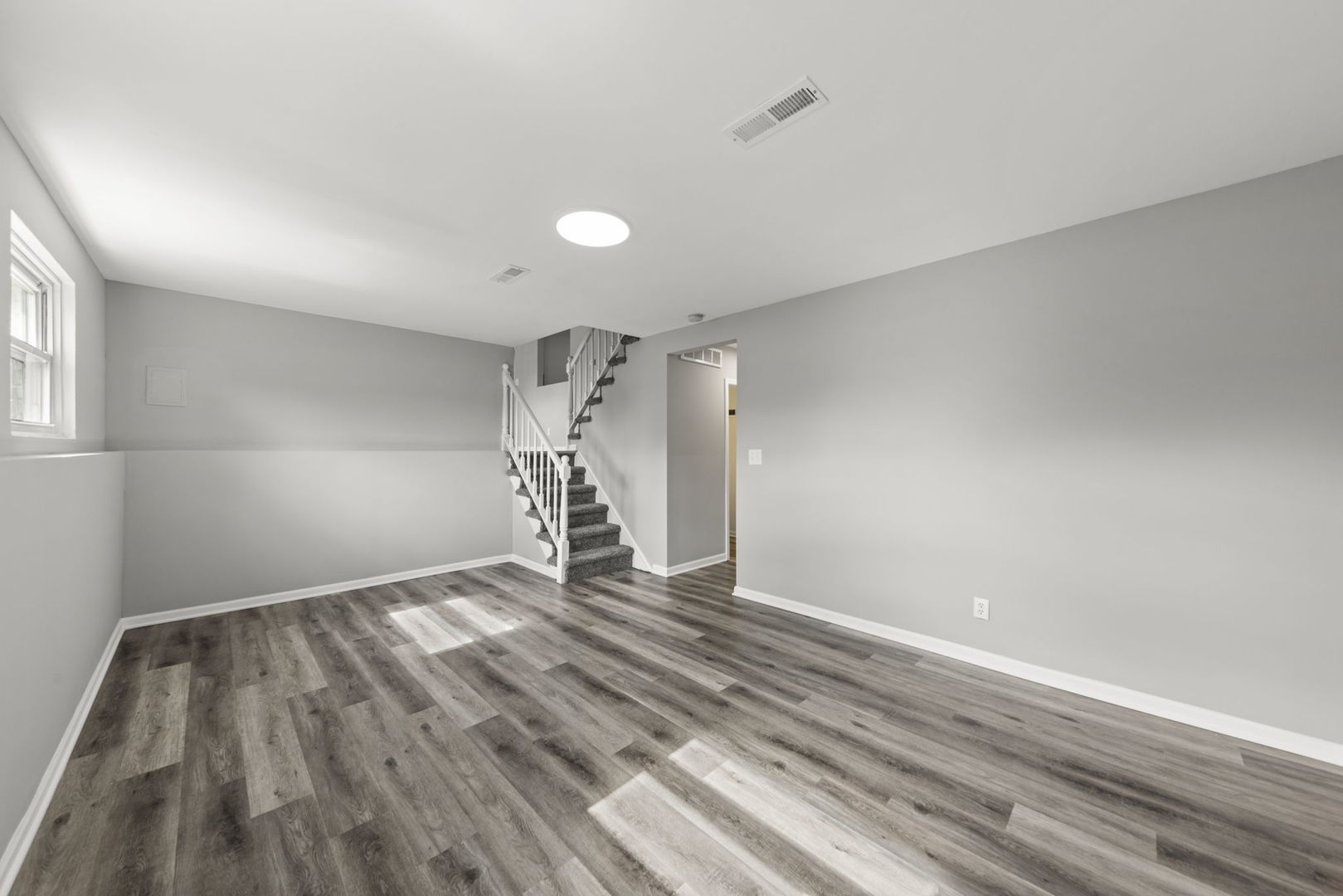 530 East Briarcliff Road Bolingbrook, IL 60440 - Photo 13 of 19 a view of empty room with wooden floor