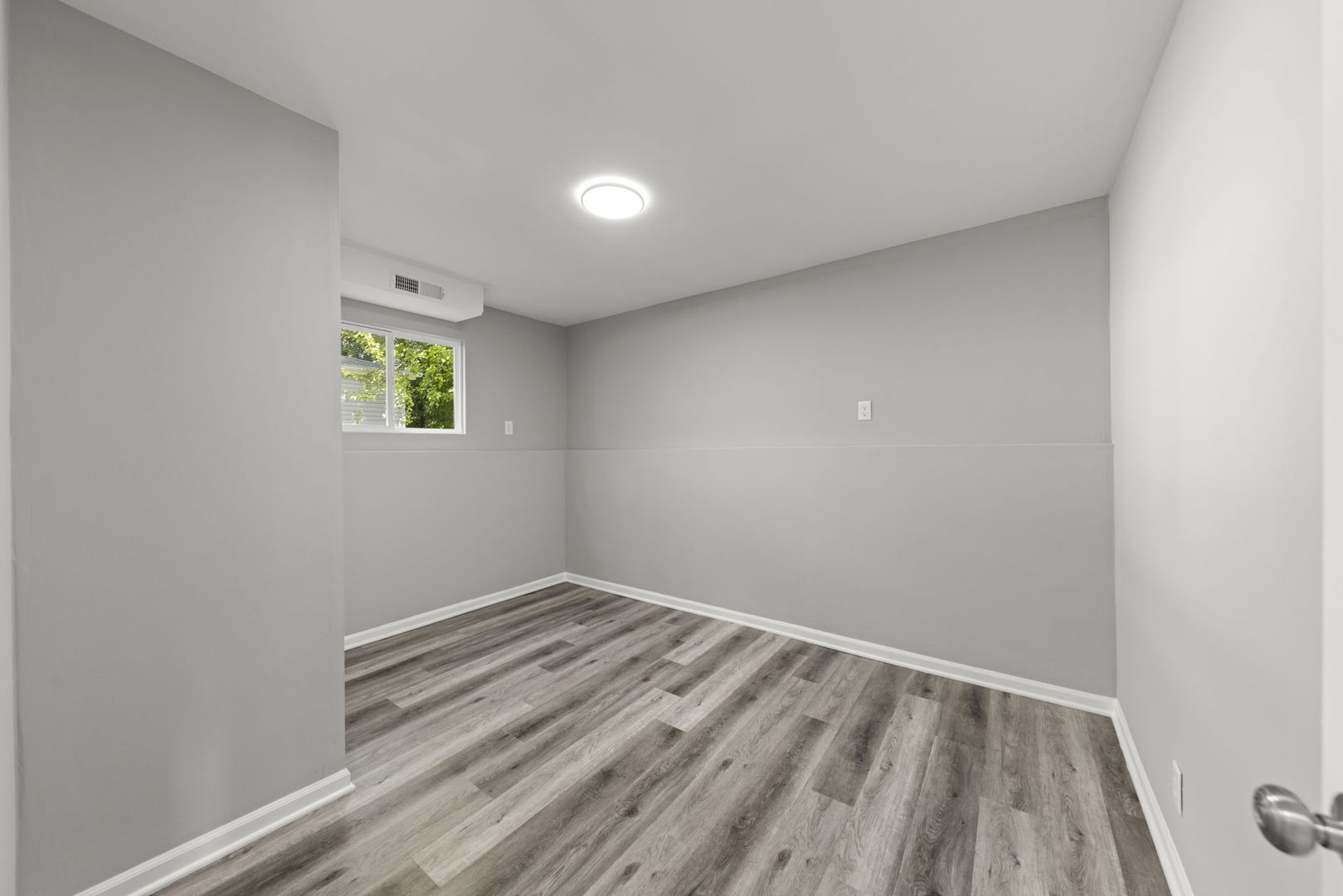 530 East Briarcliff Road Bolingbrook, IL 60440 - Photo 15 of 19 a view of room with window and wooden floor