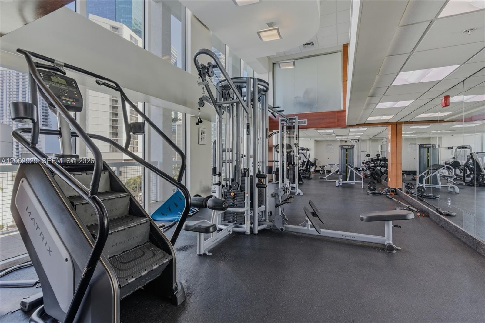 31 Southeast 5th Street, Unit 2301 Miami, FL 33131 - Photo 29 of 50 a view of a room with gym equipment