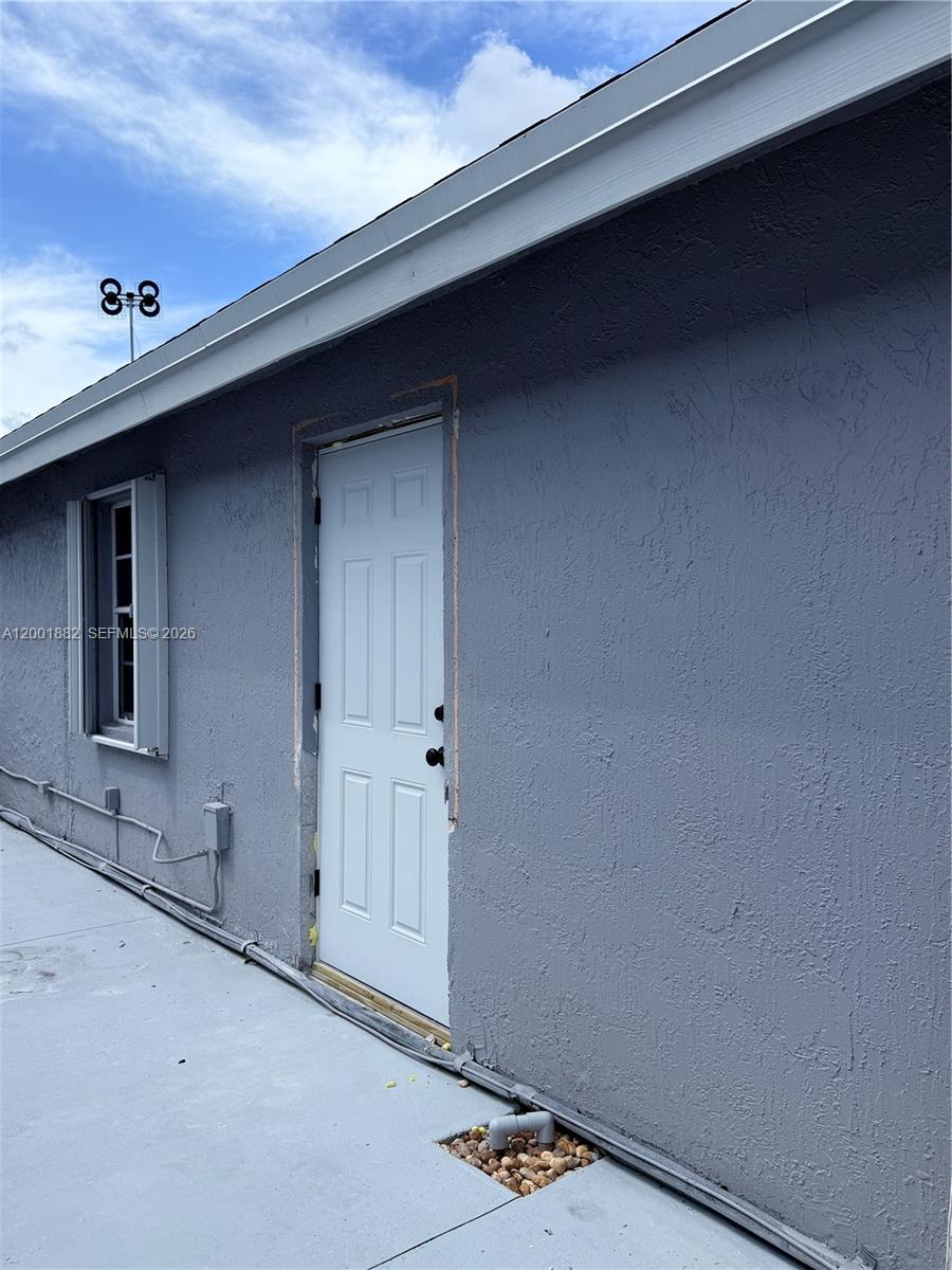 14220 Southwest 53rd Street, Unit B Miami, FL 33175 - Photo 2 of 2 a view of utility room