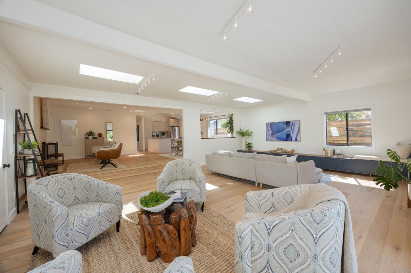 1460 Flores Drive Pacifica, CA 94044 - Photo 19 of 69 a living room with furniture and a wooden floor