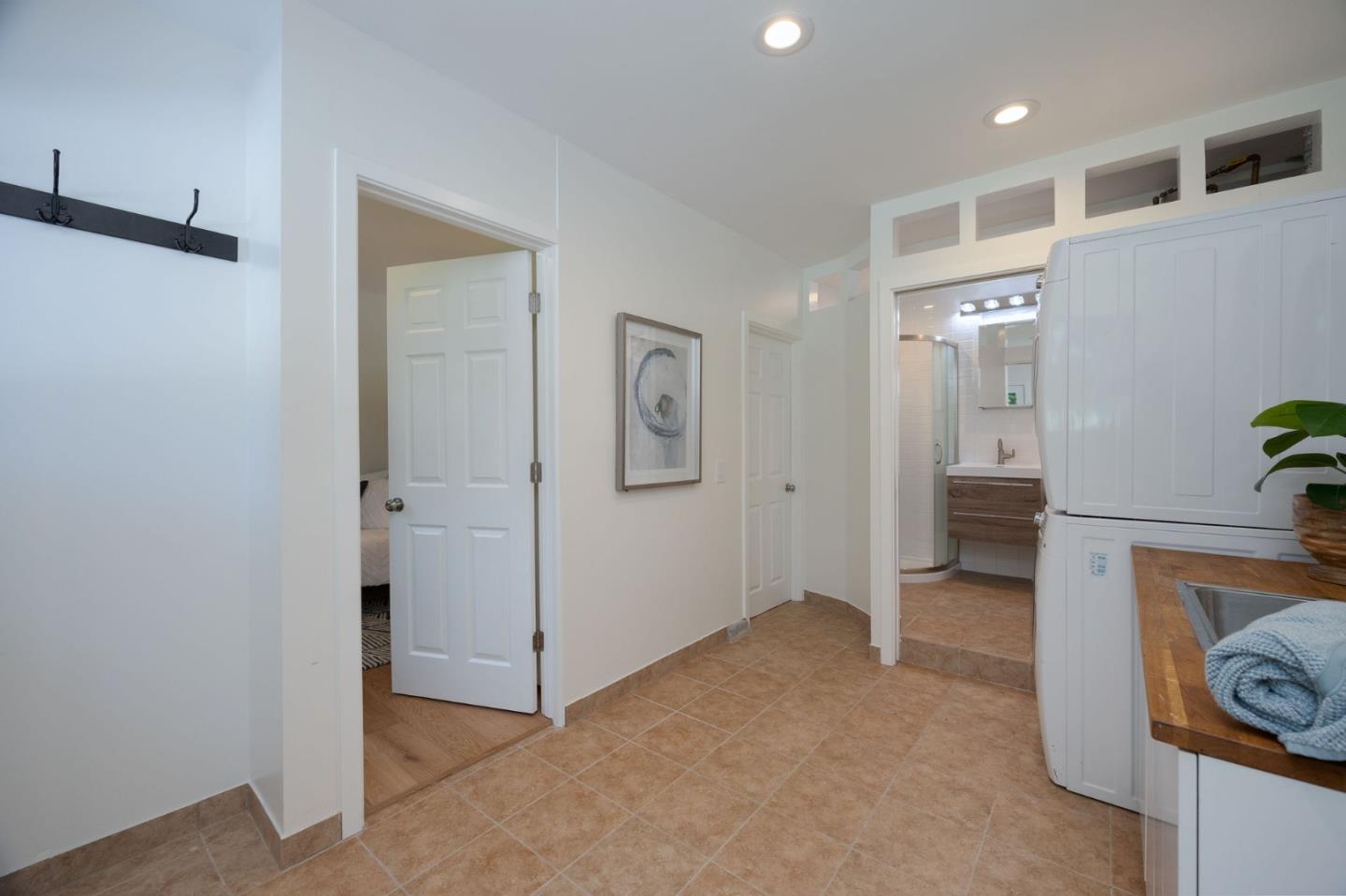 1460 Flores Drive Pacifica, CA 94044 - Photo 23 of 69 a view of a hallway and an dining rom with furniture