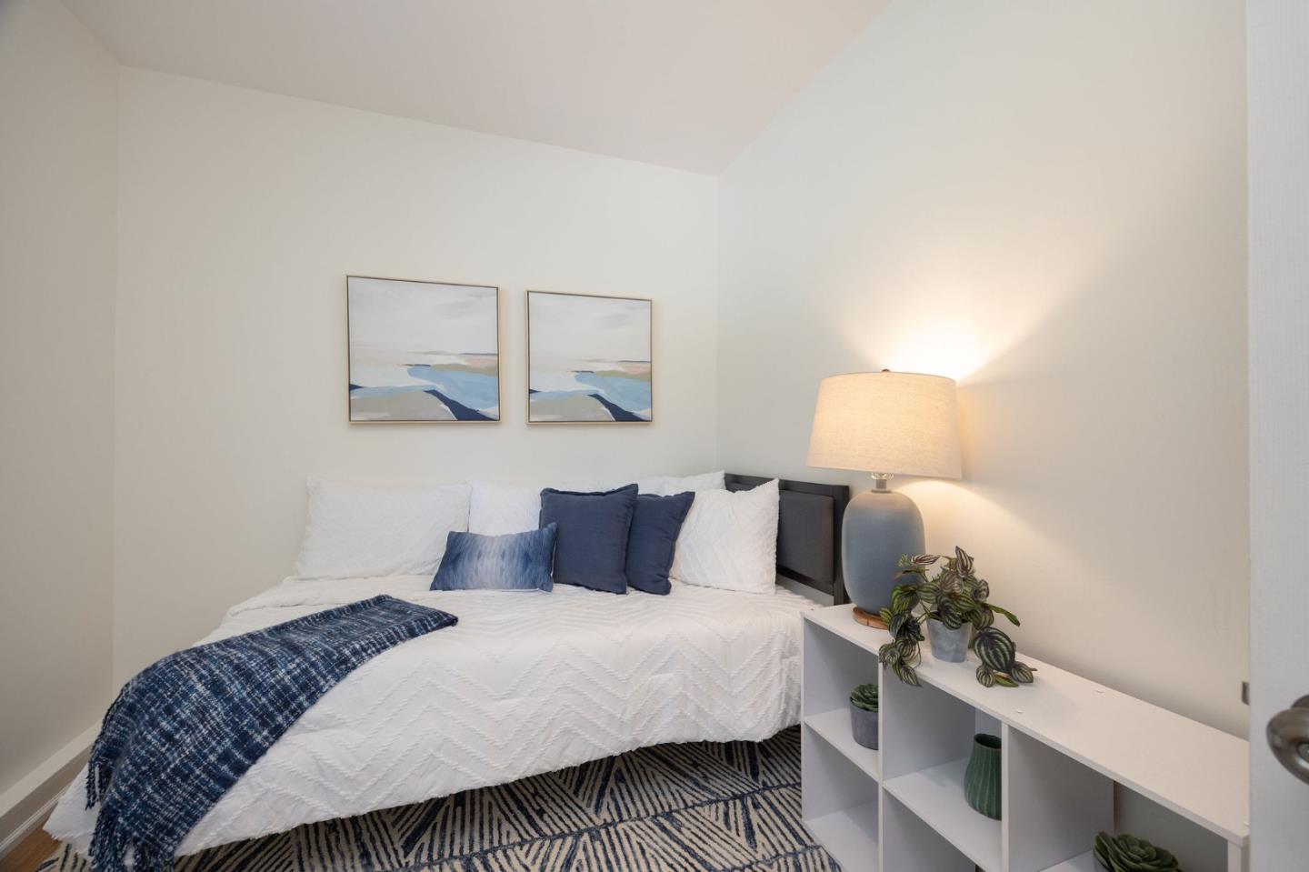 1460 Flores Drive Pacifica, CA 94044 - Photo 25 of 69 a bedroom with a bed and window