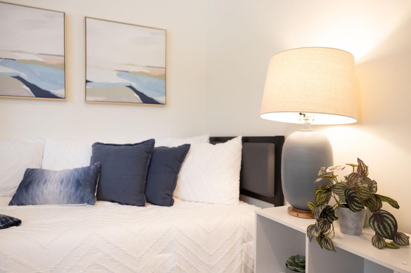 1460 Flores Drive Pacifica, CA 94044 - Photo 27 of 69 a bed room with a bed and a mirror