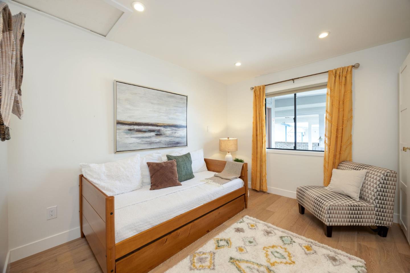 1460 Flores Drive Pacifica, CA 94044 - Photo 33 of 69 a bedroom with furniture and a window