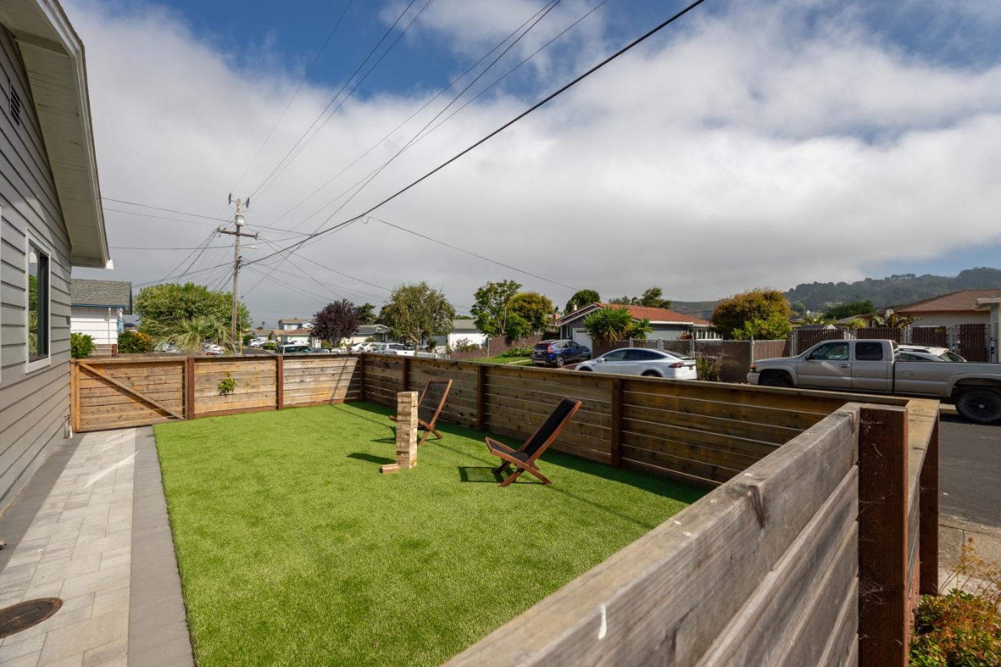1460 Flores Drive Pacifica, CA 94044 - Photo 62 of 69 a view of a swimming pool with a chairs