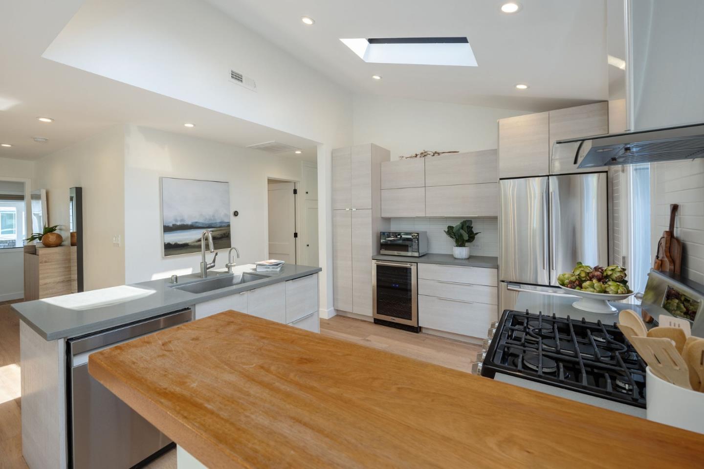 1460 Flores Drive Pacifica, CA 94044 - Photo 7 of 69 a kitchen with stainless steel appliances granite countertop a sink stove and refrigerator