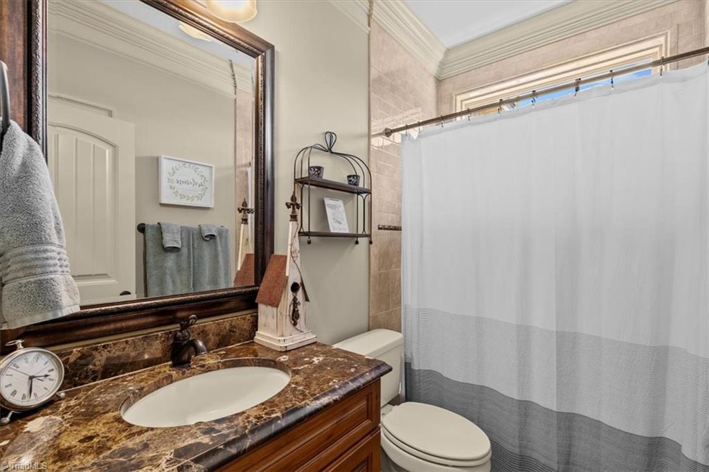 7787 Sutter Road Greensboro, NC 27455 - Photo 28 of 50 Guest bathroom