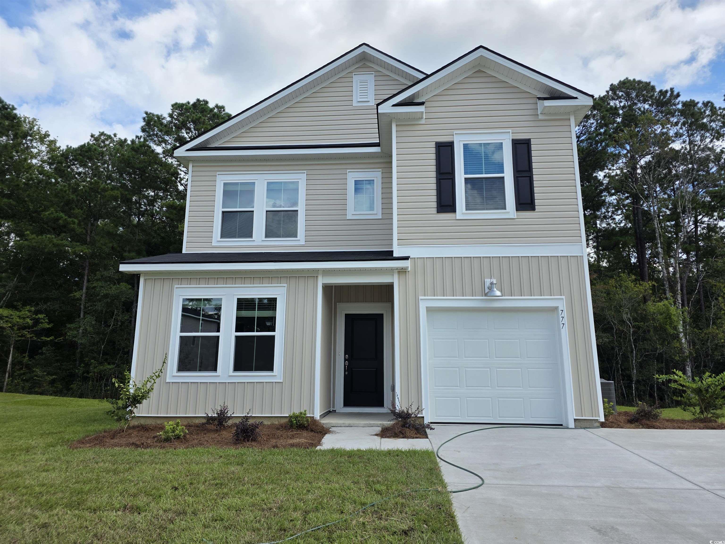 777 Sturdy Root Place Myrtle Beach, SC 29588 - Photo 1 of 15 Traditional home with driveway, an attached garage