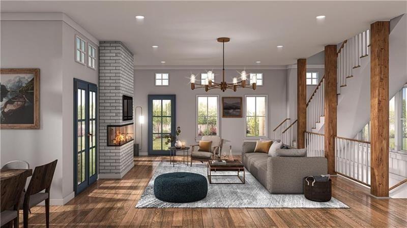 172 Railroad Street Canton, GA 30114 - Photo 4 of 8 a living room with furniture and a chandelier