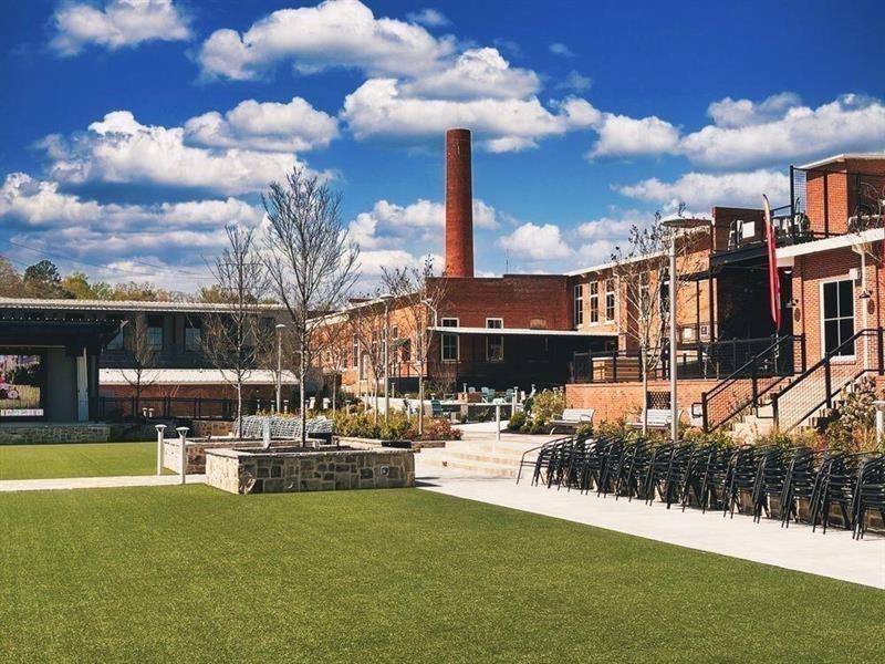 172 Railroad Street Canton, GA 30114 - Photo 6 of 8 a swimming pool view with a garden view