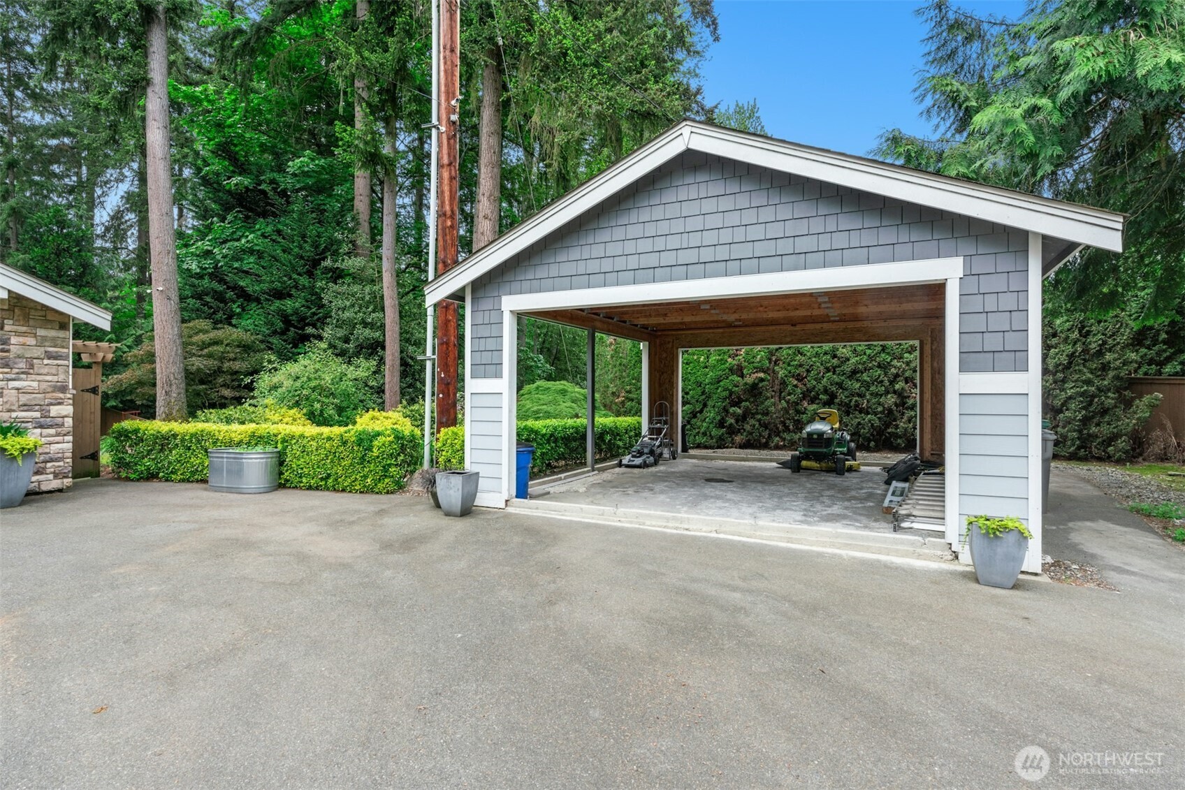 23307 49th Avenue Southeast Bothell, WA 98021 - Photo 31 of 37 a view of a house with porch and garden