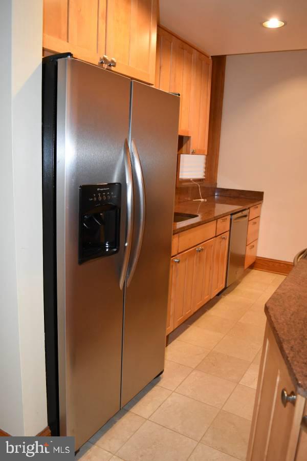 39 Bryant Street Northwest Washington, DC 20001 - Photo 5 of 17 a kitchen with stainless steel appliances granite countertop a refrigerator and a sink