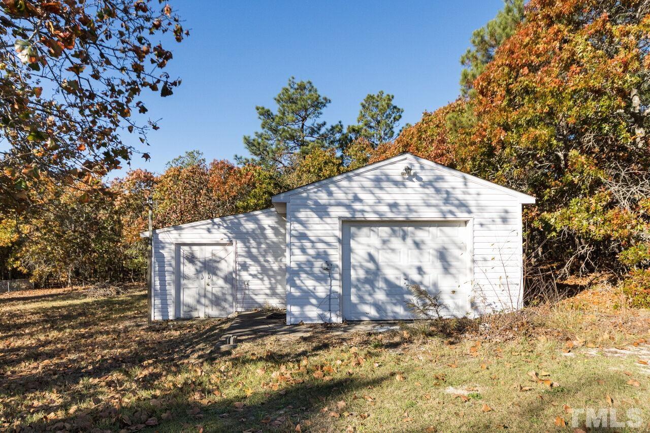 233 Eisler Drive Lillington, NC 27546 - Photo 28 of 29 a view of a wooden fence