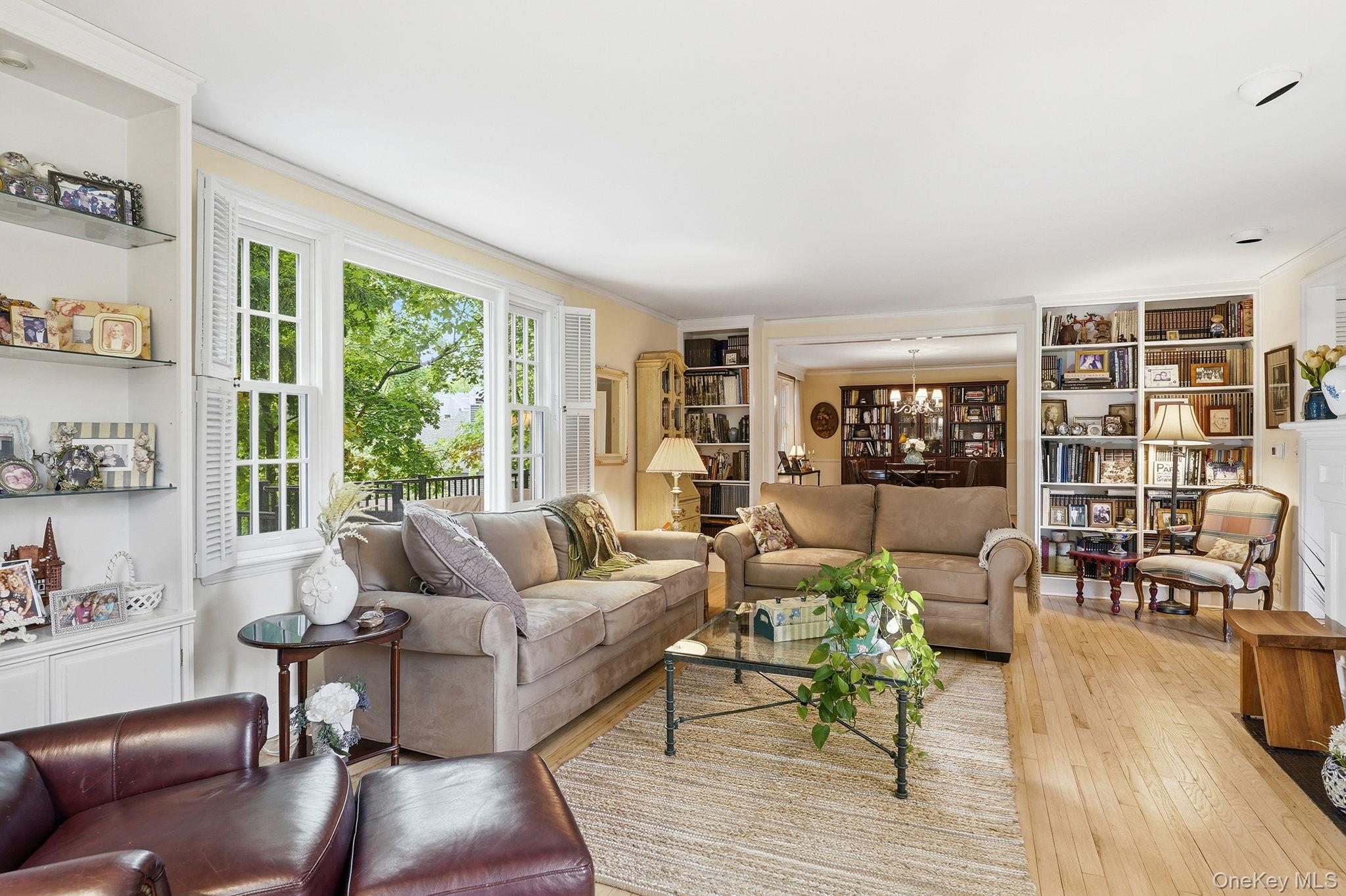 26 Cedarlawn Road Irvington, NY 10533 - Photo 7 of 34 a living room with furniture and a wooden floor