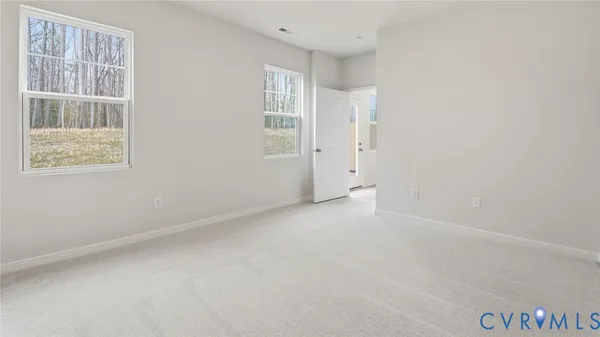 a bathroom with a granite countertop sink mirror and shower