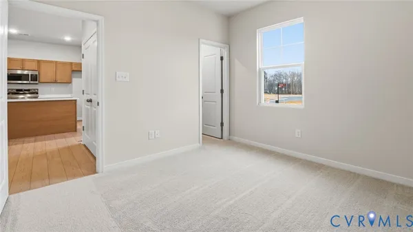 an empty room with cabinet