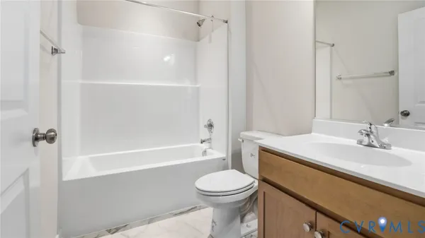 a bathroom with a sink and toilet