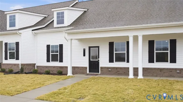 a kitchen with stainless steel appliances a stove a sink and a microwave