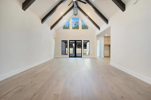 an entrance to ceiling window and a ceiling fan