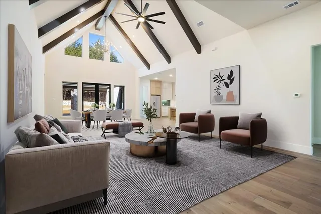 a living room with furniture and a rug