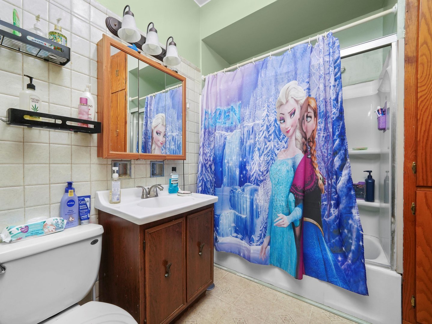 2131 North Springfield Avenue Chicago, IL 60647 - Photo 21 of 30 a bathroom with a sink toilet and shower