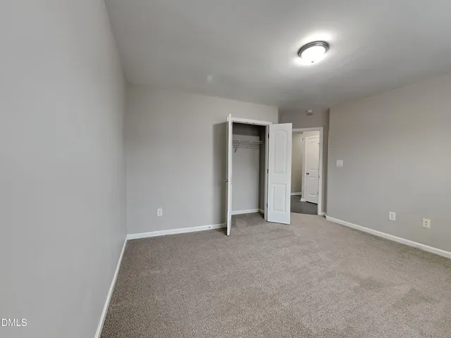 an empty room with an entryway
