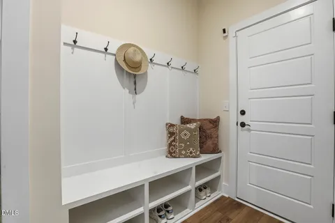 a room with furniture and wooden floor