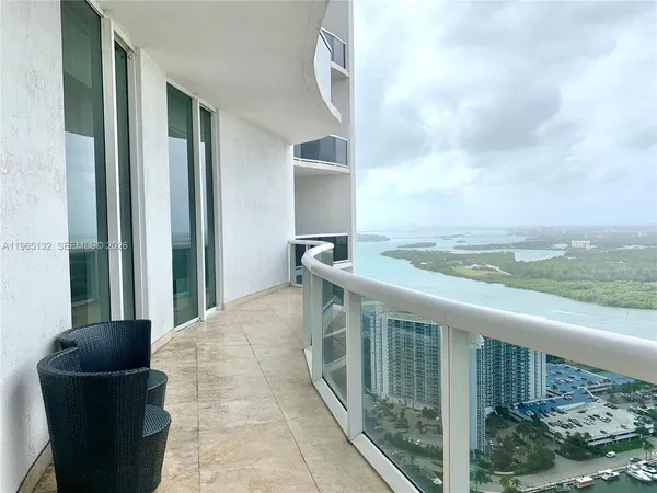 a view of balcony with furniture