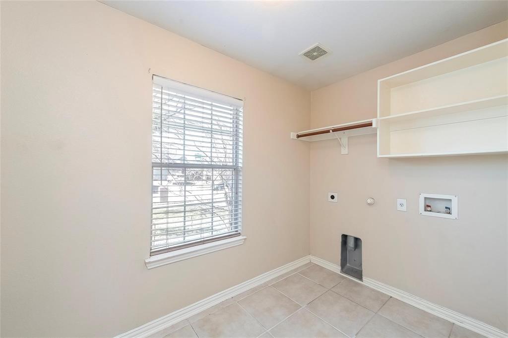 2716 Dawn Spring Drive Little Elm, TX 75068 - Photo 12 of 23 a view of an empty room with a window