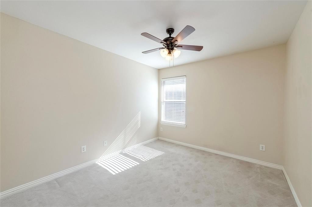2716 Dawn Spring Drive Little Elm, TX 75068 - Photo 18 of 23 a view of an empty room with a window