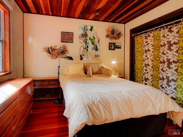 a backyard of a house with barbeque oven