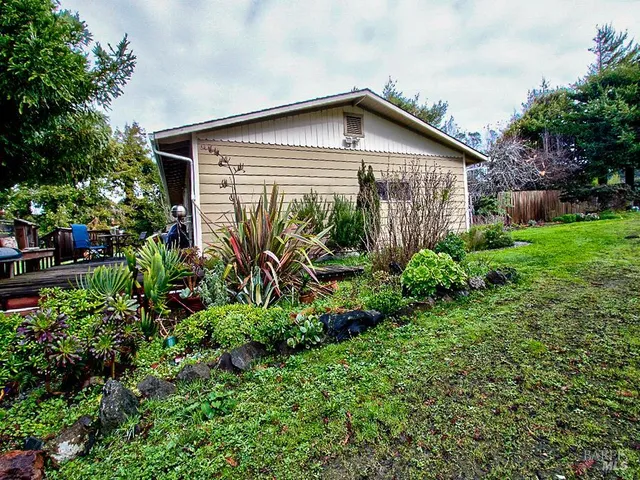 a view of a pathway with a patio