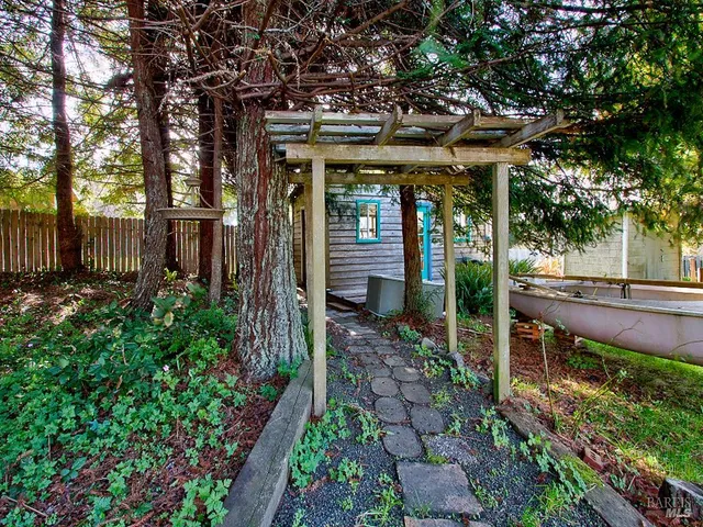 a view of a swimming pool with an outdoor space and seating area