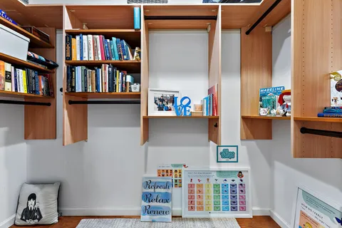 an aerial view of multiple houses with yard