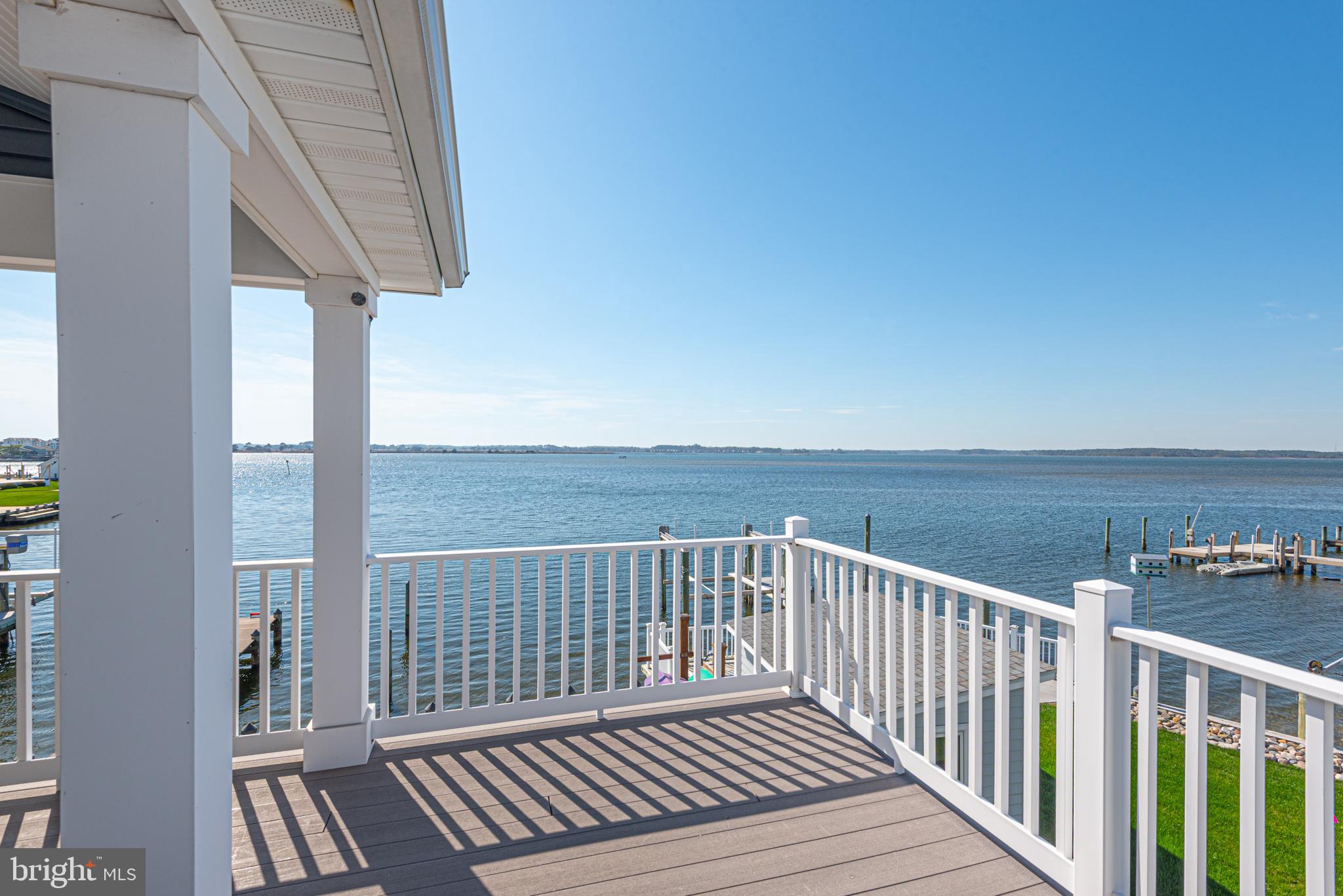 1502 Bay Street Fenwick Island, DE 19944 - Photo 20 of 62 a view of a balcony with wooden floor