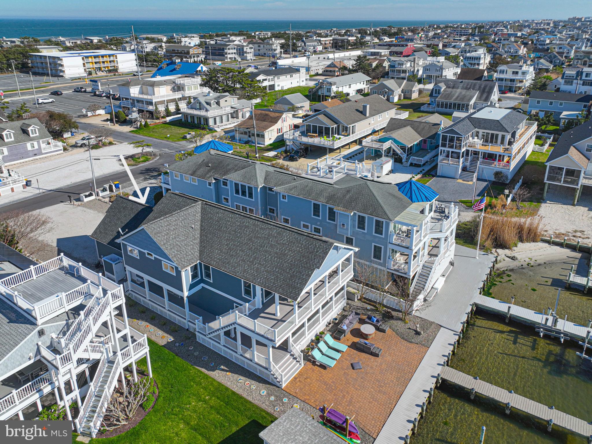 1502 Bay Street Fenwick Island, DE 19944 - Photo 6 of 62 an aerial view of a building with outdoor space