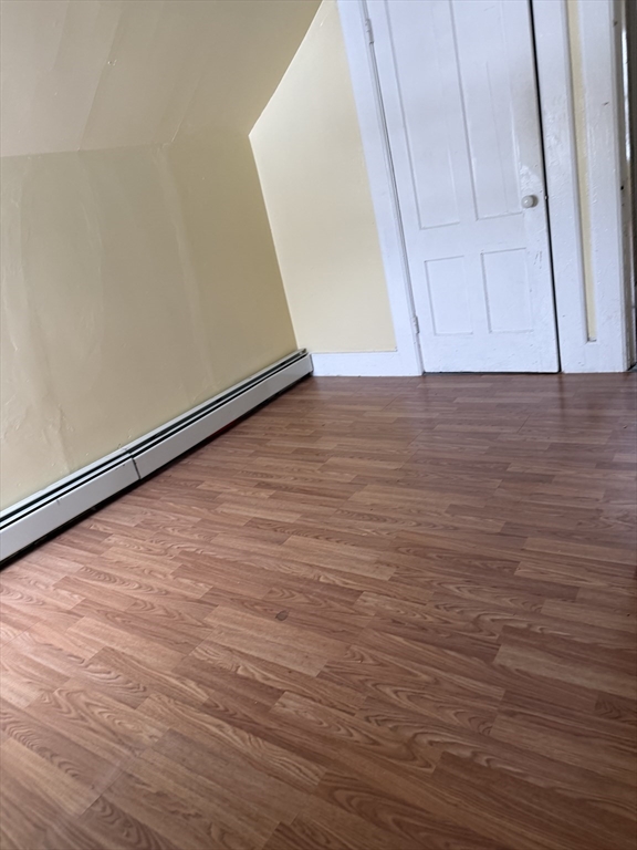 111 Bay, Unit 113 Springfield, MA 01109 - Photo 13 of 13 a view of room with wooden floor