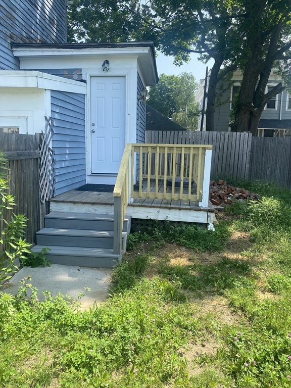 111 Bay, Unit 113 Springfield, MA 01109 - Photo 3 of 13 a view of deck with chair and garden