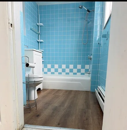 a bathroom with a sink and a shower