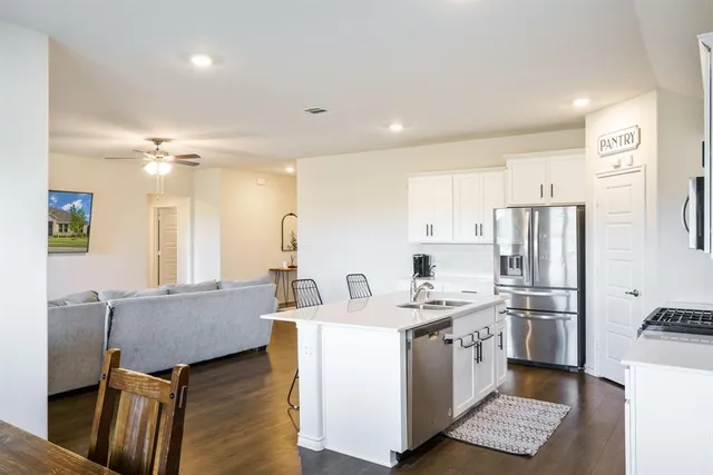 a view of a yard in front of a house with a yard