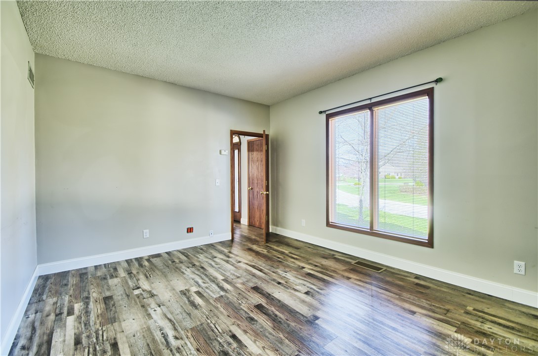 8711 Nicole Lane Springboro, OH 45066 - Photo 27 of 87 This bright room features durable flooring and abundant natural light, creating a welcoming atmosphere.