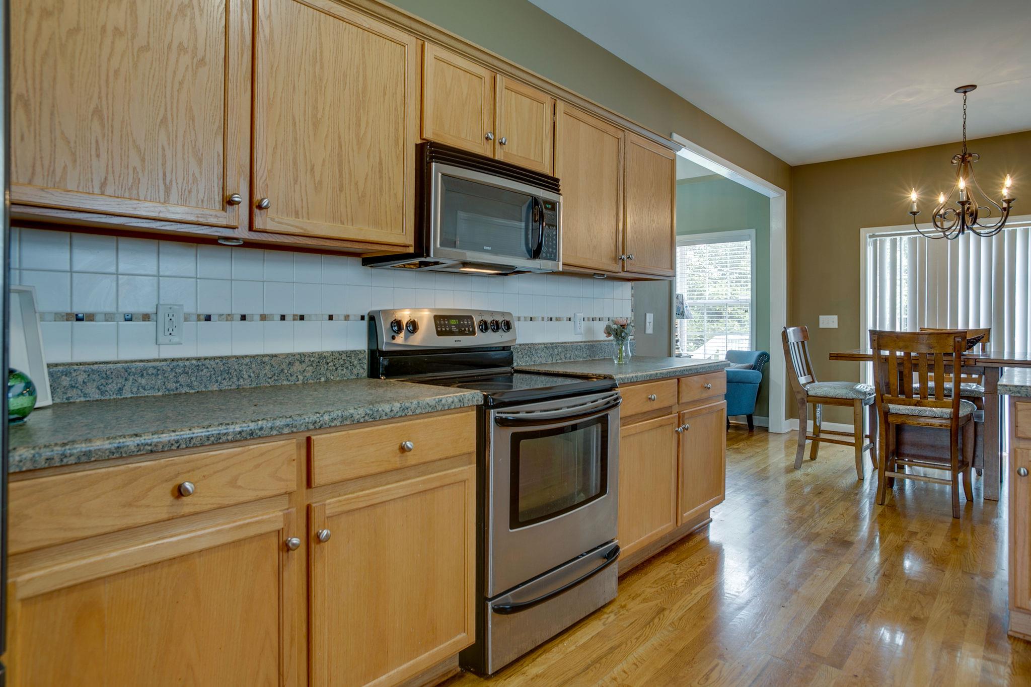 824 Renaissance Avenue Murfreesboro, TN 37129 - Photo 5 of 20 Bright kitchen with hardwood floors and stainless steel appliances